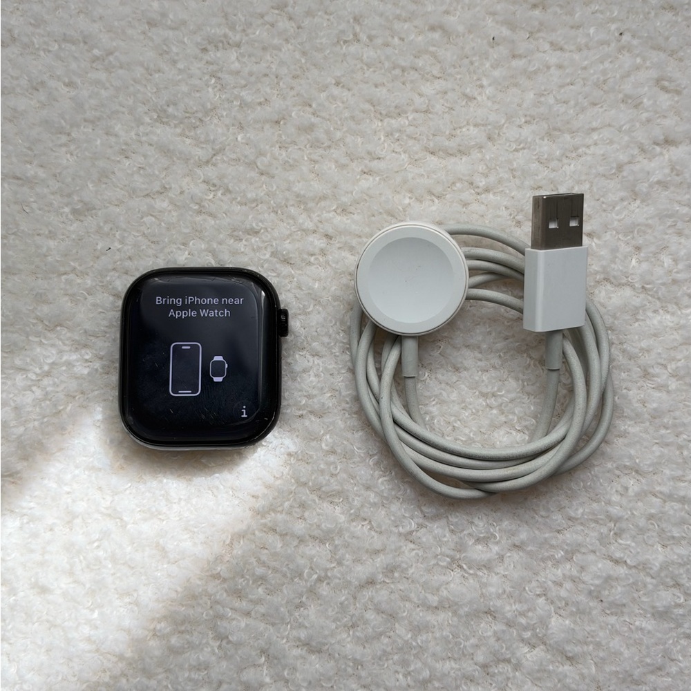 Apple Watch (Black) with White Magnetic Charging Cable